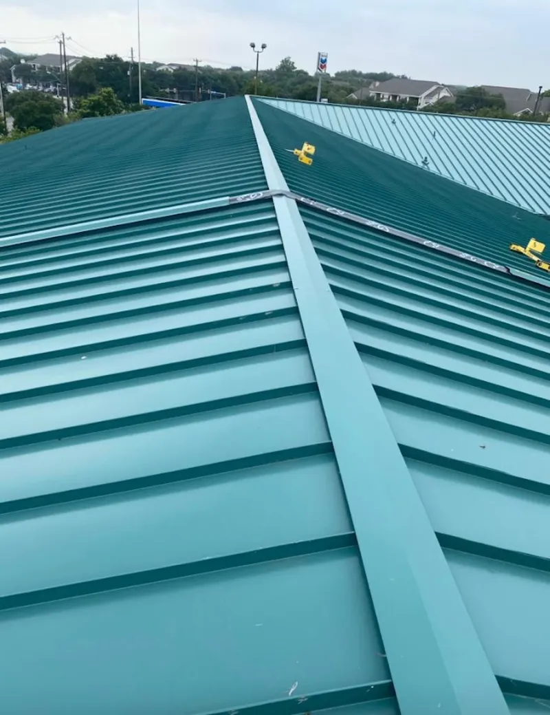 Green commercial metal roof ridge and valley for Metal Roof Repair in Olivarez