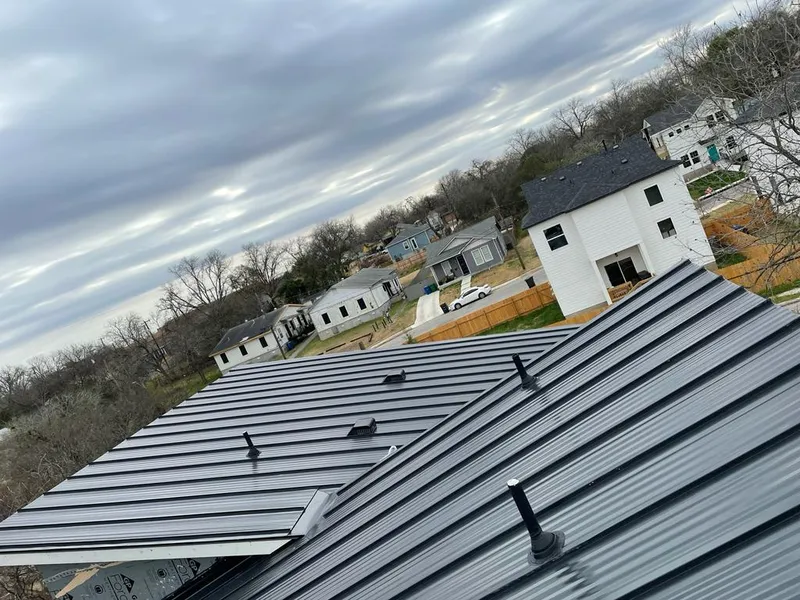 Standing seam metal roof panels with vents for Skylight Repair in Olivarez